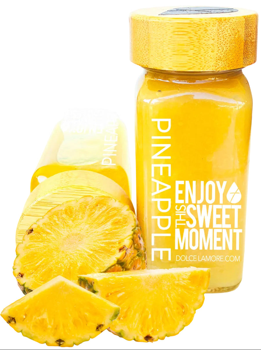 Pineapple puree in a glass bottle.