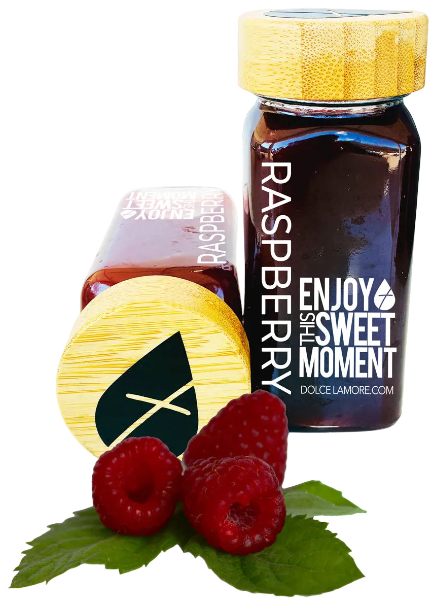 Raspberry puree in a glass bottle with bamboo lid. Features real raspberry fruit fresh off the vine.